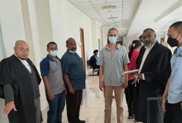 Two Malaysians and a Pakistani were cleared of trafficking charges.